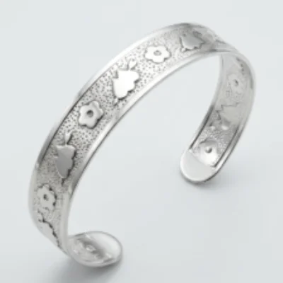 Ornate Silver Cuff Bracelet with Floral and Tulip Motif Design